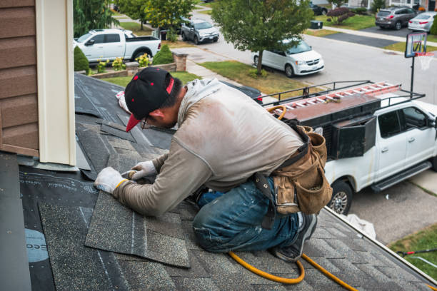 Professional Gutter Repair And Installation technician working in Pope Army Airfield, NC